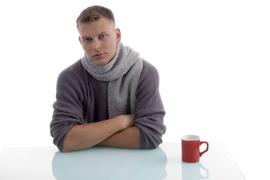 handsome male with coffee mug against white background