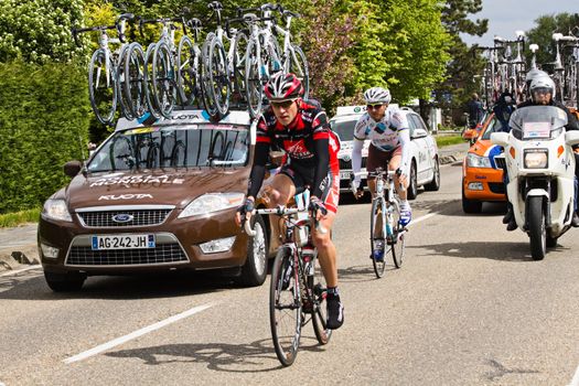 DELFGAUW, NETHERLANDS - MAY 10: Competitors and following teams in the Giro d�Italia passing by on a polderroad in the 3th stage of the competition on May 20, 2010, Delfgauw, the Netherlands. 