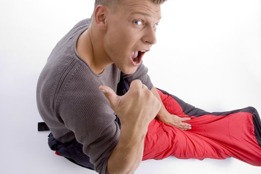 man posing with facial expressions on an isolated white background