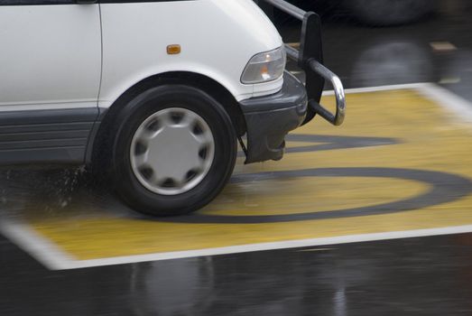 driving on a wet road through a 40 zone