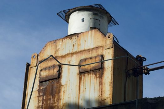 old rusted cooling unit from a refrigeration plant