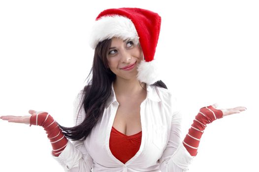 smiling woman wearing christmas hat with open palms on an isolated background