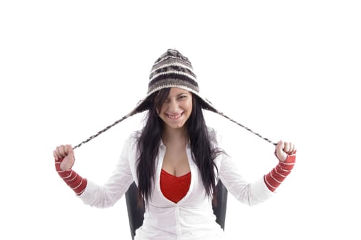 pretty girl stretching her cap on an isolated white background