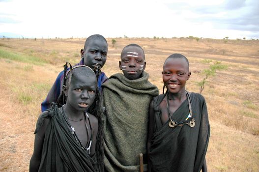 Smiling Masai african children in savana Tanzania, Africa, 15 agust 2004