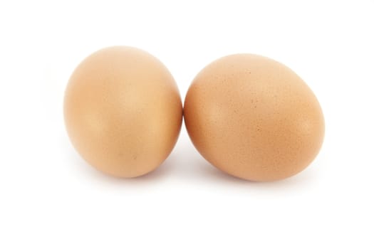 Two Organic brown Eggs on white