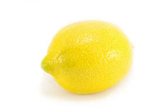 Whole fresh yellow lemon isolated on white