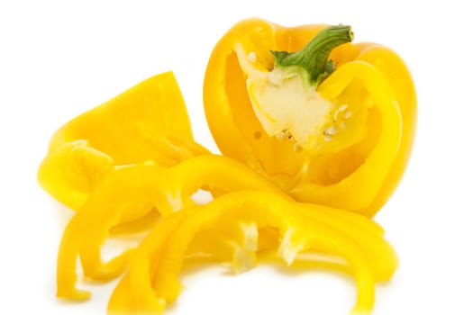 Sliced yellow pepper isolated on a white background