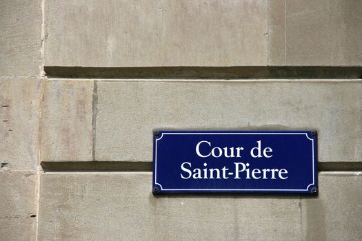 Cour de Saint-Pierre. Street sign in Geneva, Switzerland.