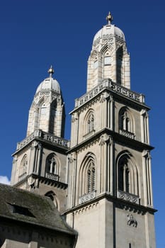 Beautiful towers of Romanesque style ex-cathedral church in Zurich, Switzerland. The church had important role in both Protestant and Catholic denominations.