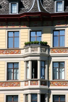 Beautiful, decorated buildings next to Limmat River in Zurich, Switzerland