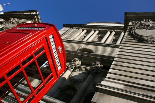 Typical London phone booth in abstract view - symbol of Great Britain.