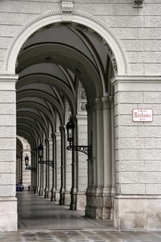 Arched passage next to the City Hall (Rathaus) in Vienna