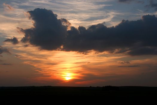 Sunset view in Austria. Colorful sky and clouds.