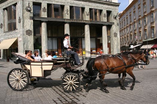 Vienna streets - horsedrawn carriage for tourists. Famous Austrian city.