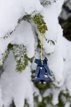 This image shows a little blue bell for a Christmas Tree with stars
