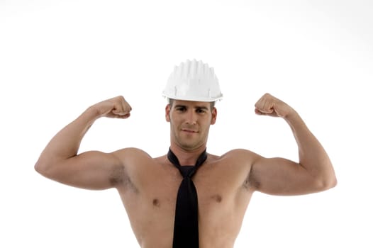 muscular man wearing architect helmet on an isolated background