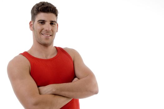 handsome male model posing against white background