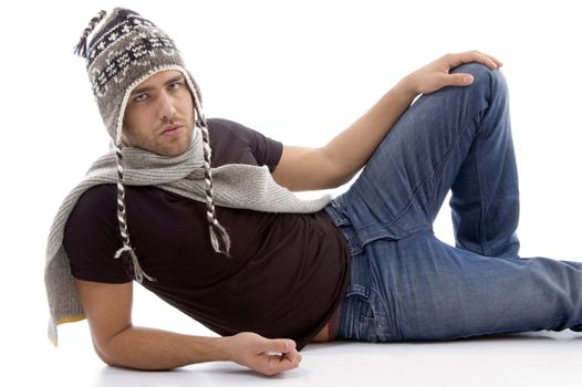 cool handsome guy wearing woolen cap against white background