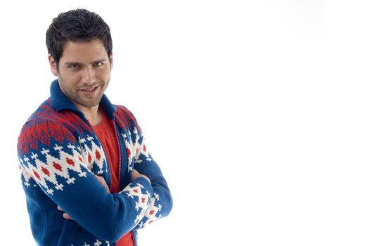 smiling handsome man with crossed arms against white background