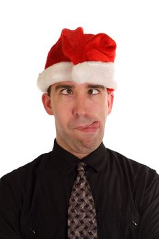 An employee making a funny face while wearing a Christmas hat
