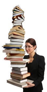 girl holding a very large pile of books