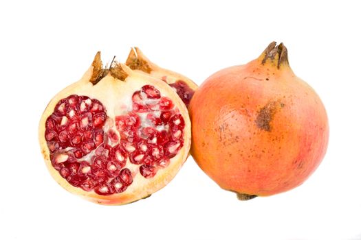 detail of a pomegranate isolated on white background