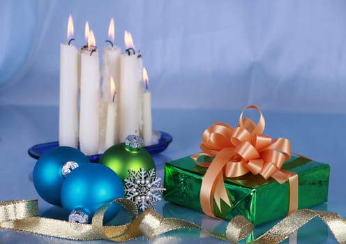 Christmas decorations on blue background , focus on foreground objects