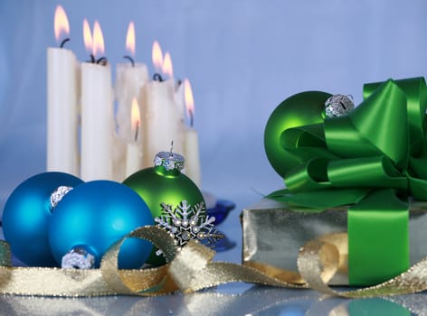 Christmas decorations on blue background , focus on foreground objects