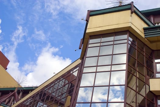 Modern building from a brick. Glass windows.