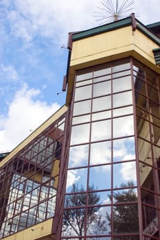 Modern building from a brick. Glass windows.