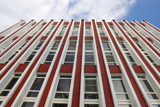Modern building from a brick. Glass windows.