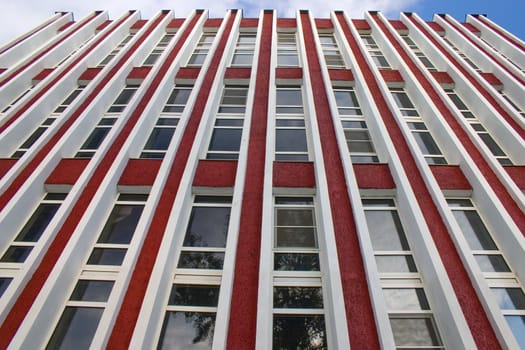 Modern building from a brick. Glass windows.