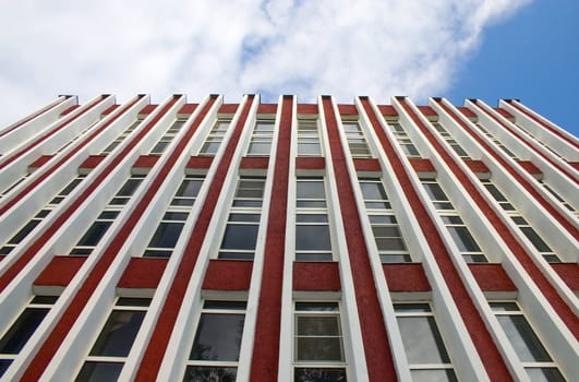 Modern building from a brick. Glass windows.