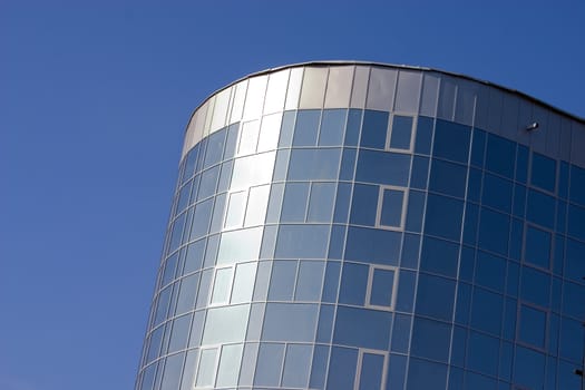 Modern urban building. Glass windows.
