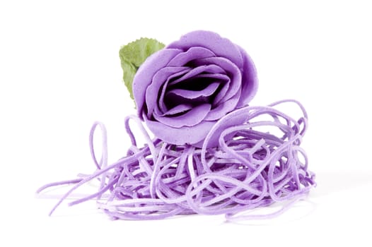 beautiful purple rose on a white background