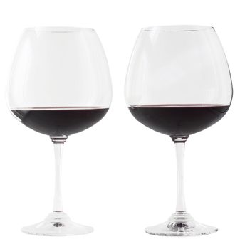 Two glasses of red wine over white background