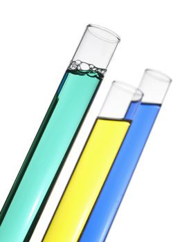 Three test tubes filled with colored liquids. Isolated on white.