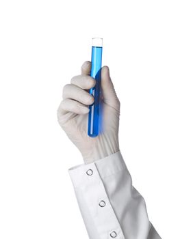 A doctor's hand holds a test tube filled in with a blue liquid. Isolated on white.