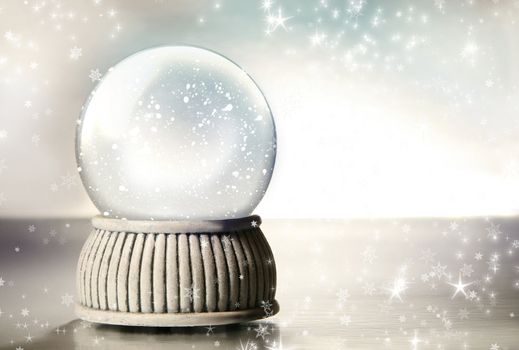 Snow globe against a silver background