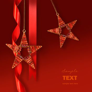 Christmas star ornaments against red holiday background
