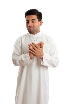 A worried,troubled, stressed or sad ethnic middle eastern or arab man in traditional  white robe.  White background.