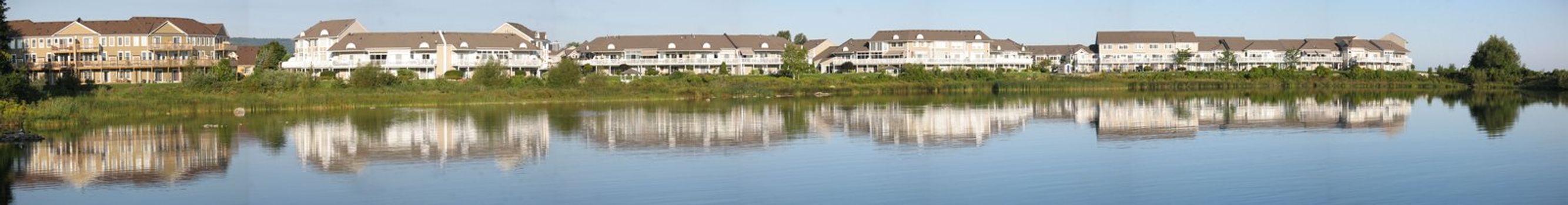 A panorama of a line of condos on Geoergian Bay, Ontario