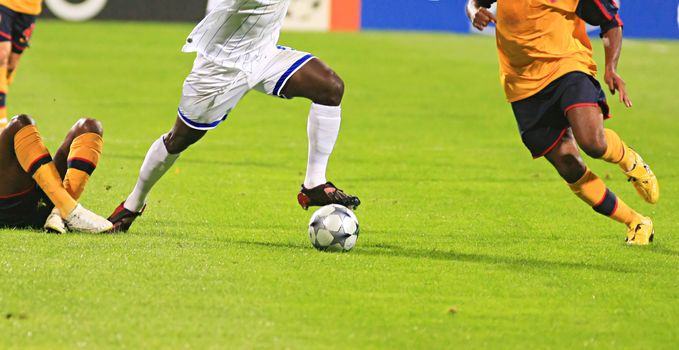  Detail of a soccer game with many players in action