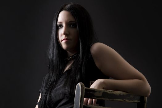 teen girl with black hair and goth style 