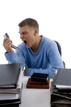 man shouting on phone with white background