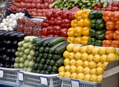 Multicolored particulars vegetables on the grocery market. Multicolored and freshness.