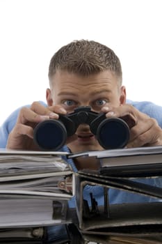 young man looking through binocular on an isolated white background
