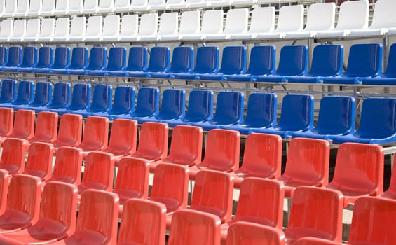 Tribune victory parade in the colors of the Russian flag. Empty space for veterans. Close-up.