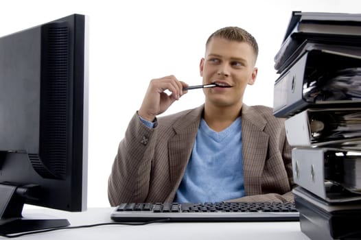 young man sitting in office on an isolated white background