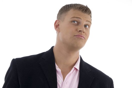 portrait of businessman looking upward on an isolated background